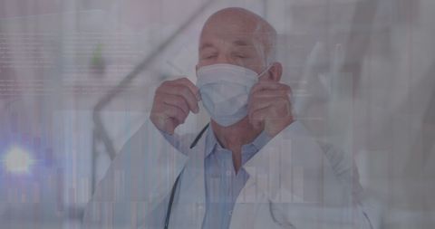 Doctor wearing mask with data graphics overlay during pandemic