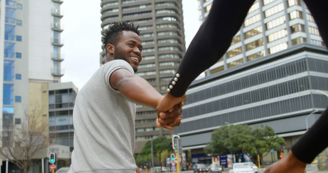 Happy Young Man Holding Hand Urban Street Background - Download Free Stock Images Pikwizard.com