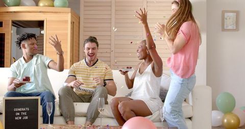 Friends celebrating new job with enthusiasm and joy