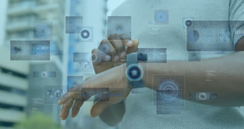 Man Interacting with Futuristic Smartwatch Holograms