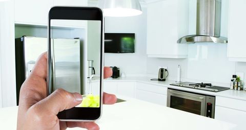 Smartphone Capturing Modern Kitchen Interior for Online Design - Download Free Stock Images Pikwizard.com