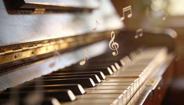 Sunlit vintage upright piano keyboard with floating musical notes and warm bokeh details