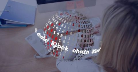 Female office worker typing at desk with blockchain globe overlay for digital connectivity
