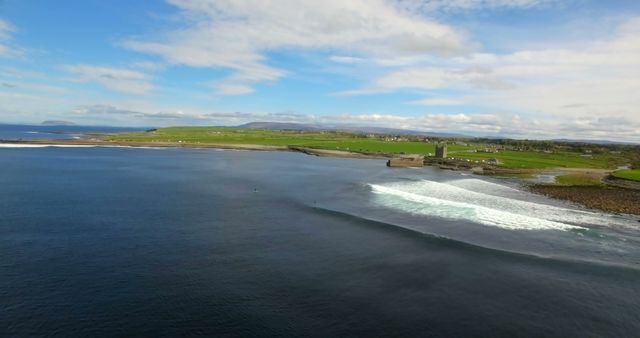 Scenic Coastal Landscape with Rolling Waves and Green Pastures - Download Free Stock Images Pikwizard.com