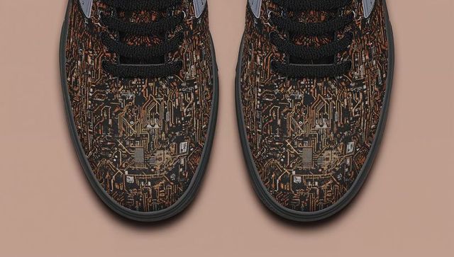 Top-down sneaker pair with copper circuit board print on neutral beige background, futuristic detail