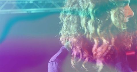 Scenic Neon Stage With Vibrant Lighting and Performer