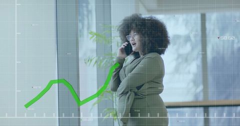 Businesswoman Discussing Financial Trends in Office Setting