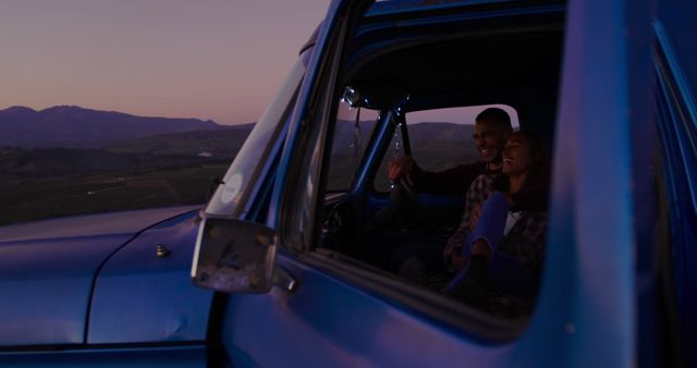 Couple Enjoying Sunset View from Vintage Pickup Truck - Download Free Stock Images Pikwizard.com