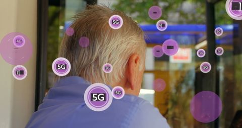 Senior Man Experiencing 5G Technology Through Glass Window