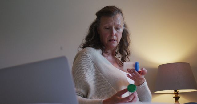 Mature Woman Using Inhaler in Bedroom - Download Free Stock Images Pikwizard.com