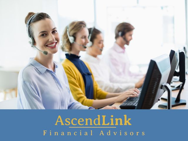 Financial advisors wearing headsets working in a call center environment. A woman in the foreground is smiling, giving a positive and approachable vibe. The setting suggests a professional team offering financial advice and support. Ideal for use in promotions of financial services, customer service trainings, and business consultation services.