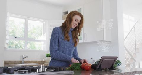 Woman Cooking in Modern Kitchen with Digital Tablet Assistance - Download Free Stock Images Pikwizard.com