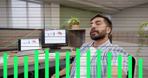 Young Professional Leaning in Open-Plan Office with Financial Charts and Data Overlay