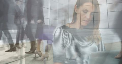 Businesswoman Balancing Remote Work with Busy City Life