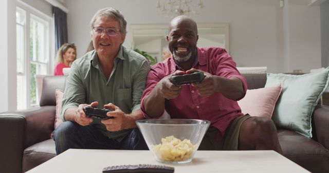 Image of happy diverse male senior friends playing image games - Download Free Stock Photos Pikwizard.com