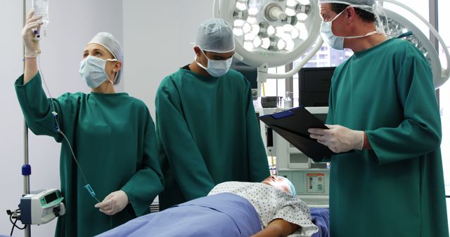 Team of Doctors Preparing for Surgery in Operating Room - Download Free Stock Images Pikwizard.com