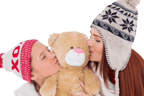 mother and daughter in winter hats hugging teddy bear on transparent background - Download Free Stock Videos Pikwizard.com
