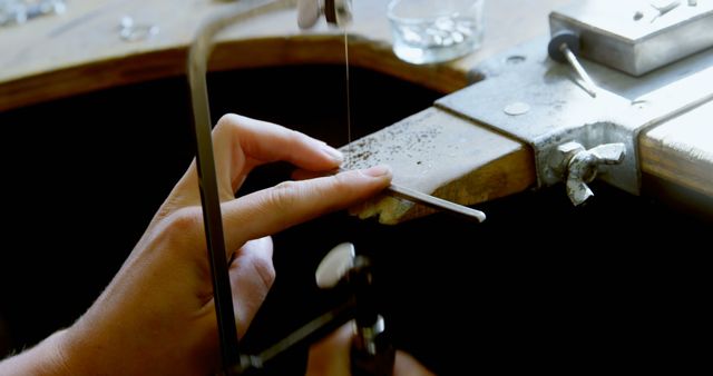 Craftsman Using Saw to Shape Jewelry in Workshop - Download Free Stock Images Pikwizard.com