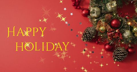 Festive Christmas Wreath with Holiday Greeting on Red Background