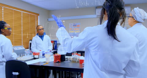 Scientists Engaging in Collaborative Lab Research with Mathematical Equations Overlay