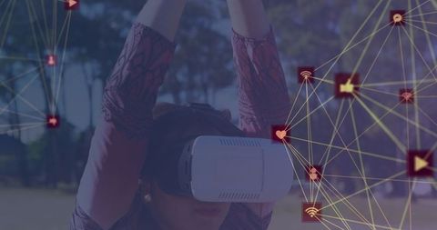 Woman engaging with futuristic virtual reality network outdoors
