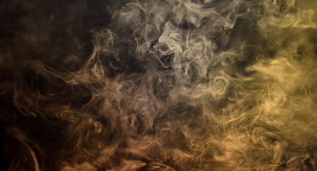 Abstract smoke drifting through ambient light creates a mysterious and ethereal atmosphere. Ideal for backgrounds, digital art projects, or designs needing a surreal or mystical touch.