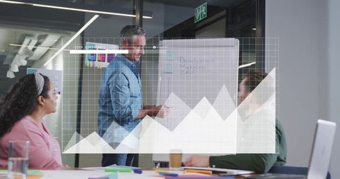 Team planning strategy discussed in modern office environment