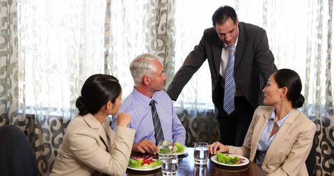 Colleagues Engaging in Business Lunch Meeting
