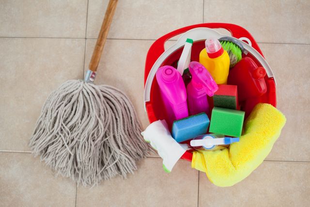 Cleaning Supplies and Mop on Tile Floor - Download Free Stock Photos Pikwizard.com