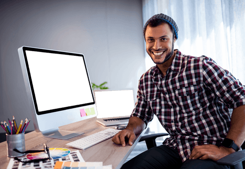 Man Smiling at Desk with Transparent Computer Screens in Office - Download Free Stock Videos Pikwizard.com