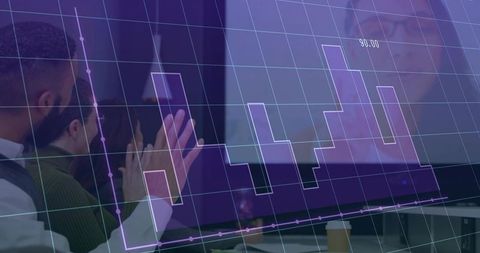 Business Team Analyzing Graph with Laptops in Modern Office