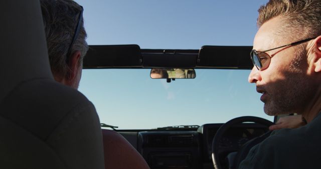 Friends on Road Trip in Convertible, Enjoying Open Sky Drive - Download Free Stock Images Pikwizard.com