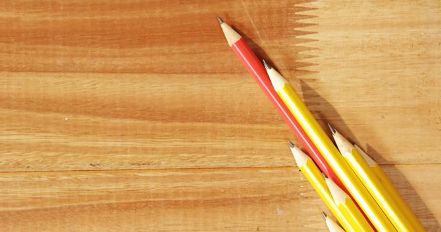 Pile of Sharpened Colorful Pencils on Wooden Desk - Download Free Stock Images Pikwizard.com