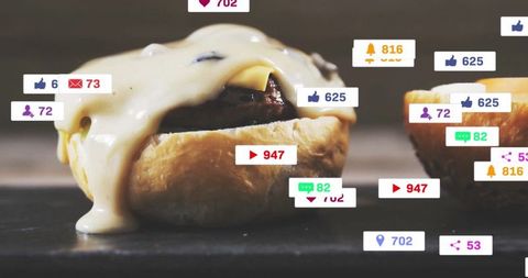 Cheese Laden Burger Surrounded by Social Media Engagement Icons