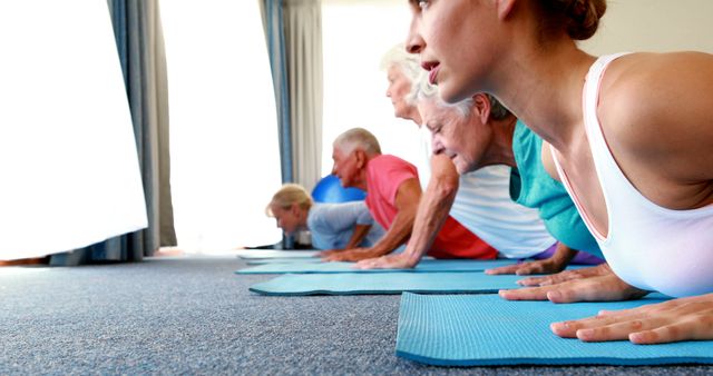 Multi-generation Group Practicing Yoga Together Indoors - Download Free Stock Images Pikwizard.com