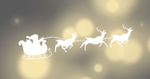 Silhouetted Santa Sleigh with Reindeer on Festive Background