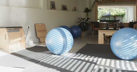 Exercise Room with Pilates Equipment and Sunlit Ambiente
