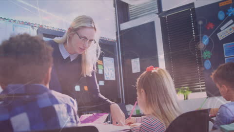 Teacher Engaging with Young Students in Classroom Setting