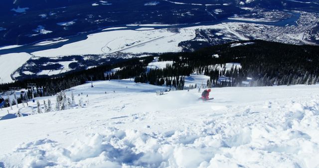 Skier Descending Snow-Covered Mountain with Scenic Valley View - Download Free Stock Images Pikwizard.com