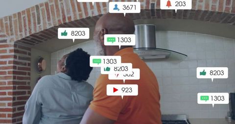 Couple cooking together in cozy brick-arched kitchen with social media engagement overlays