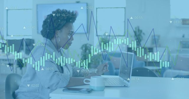 African American businesswoman in office focused on laptop, overlaying stock market and data analysis graphs, suggesting concepts of financial analysis, investment strategies, financial technology, and professional workplace environments. Ideal for illustrating financial services, economic analyses, stock trading, and business productivity themes.