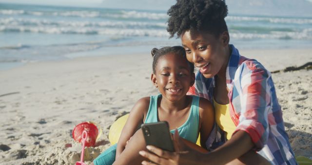 Mother and Daughter Taking Selfie on Beach - Download Free Stock Images Pikwizard.com