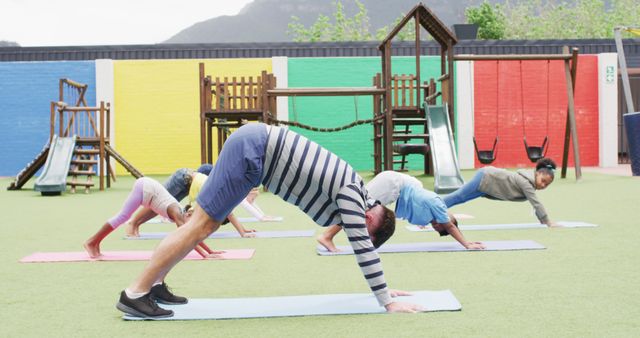 Yoga Instructor Leading Outdoor Class at Playground - Download Free Stock Images Pikwizard.com