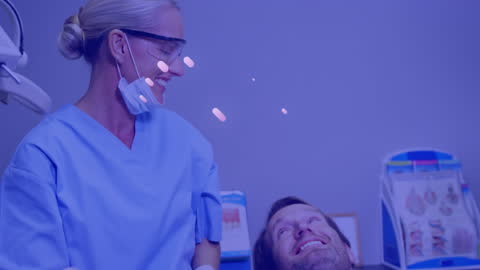 Dentist Interacting with Patient in Clinic