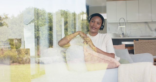 Relaxing Woman Listening to Music at Home - Download Free Stock Images Pikwizard.com