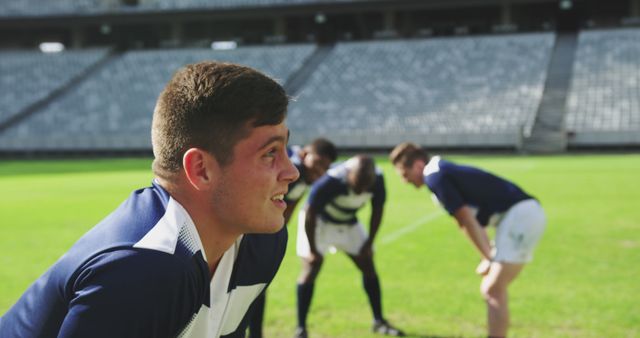 Rugby players taking a break on the field during a match - Download Free Stock Images Pikwizard.com