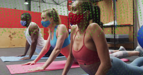 Diverse Group Exercising with Masks and Data Overlay