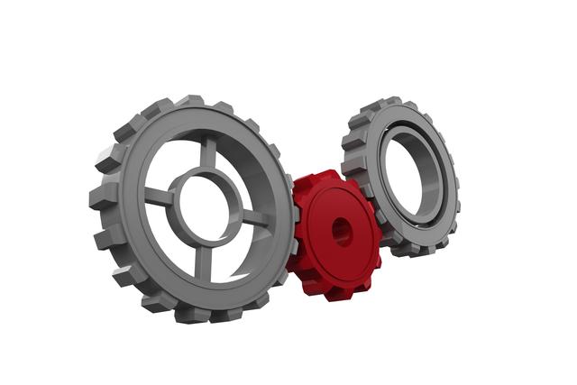 This image shows three interlocking gear wheels, with one red gear and two grey gears, on a white background. It can be used to represent concepts such as teamwork, collaboration, engineering, and mechanical processes. Ideal for use in presentations, websites, and educational materials related to technology, industry, and innovation.