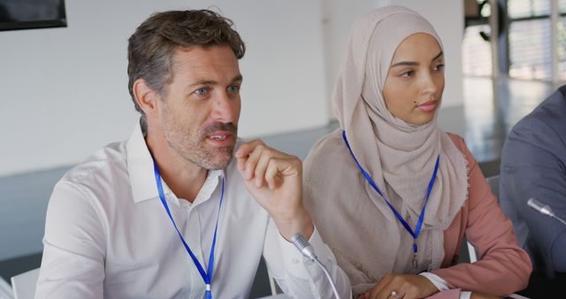 Diverse Team in Business Meeting, Man and Woman in Discussion - Download Free Stock Images Pikwizard.com