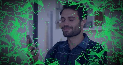 Relaxed man holding smartphone listening with eyes closed amid neon green AR network